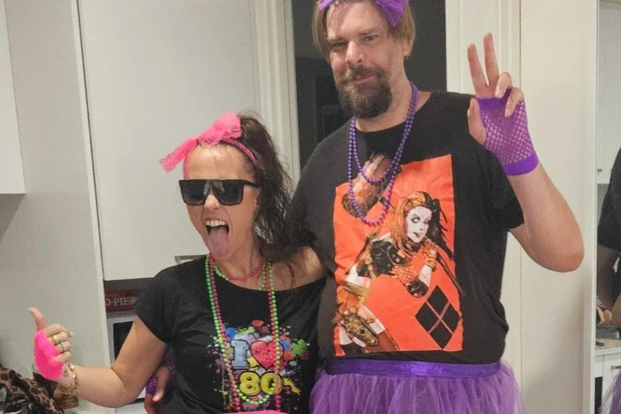 Participants and staff in costume for a themed dress-up day